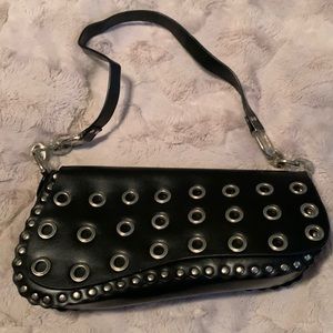 Leather Grommet studded handbag.